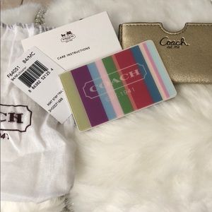 NWT Authentic Coach wallet mirror.